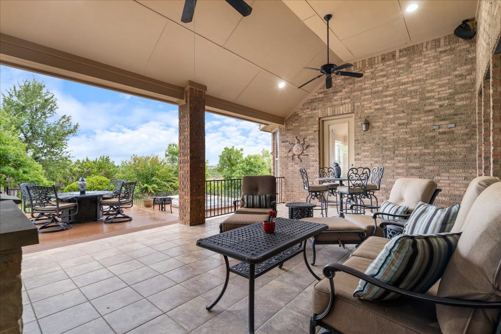 3920 Vail Divide Bee Cave, TX 78738 - Photo 29 of 34 a living room with furniture and a large window