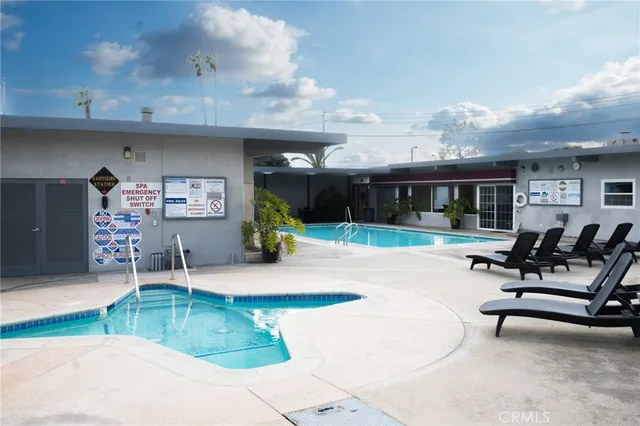 a view of a park with swings and slides