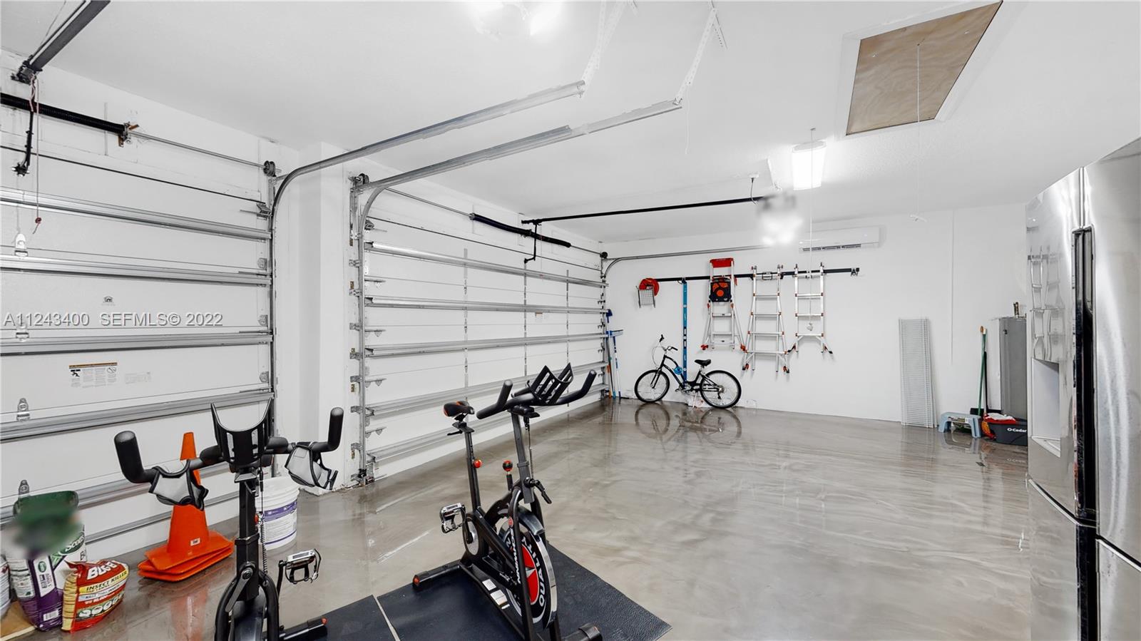 1136 Ginger Circle Weston, FL 33326 - Photo 22 of 32 a view of a room with gym equipment