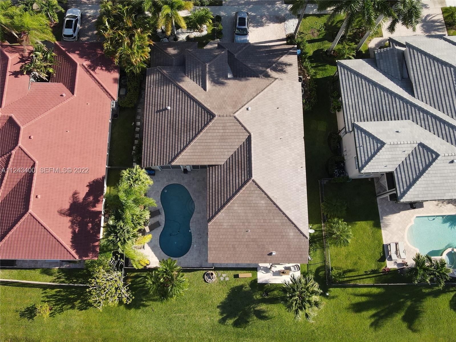 1136 Ginger Circle Weston, FL 33326 - Photo 30 of 32 an aerial view of a house