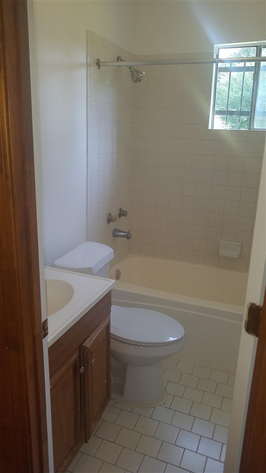 365 King Road Memphis, TN 38109 - Photo 9 of 9 a bathroom with a sink a toilet and shower