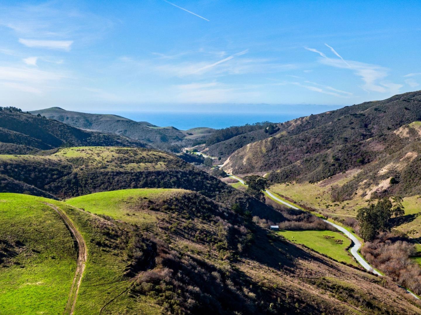 3225 Pomponio Creek Road San Gregorio, CA 94074 - Photo 11 of 24 a view of a backyard with wooden fence