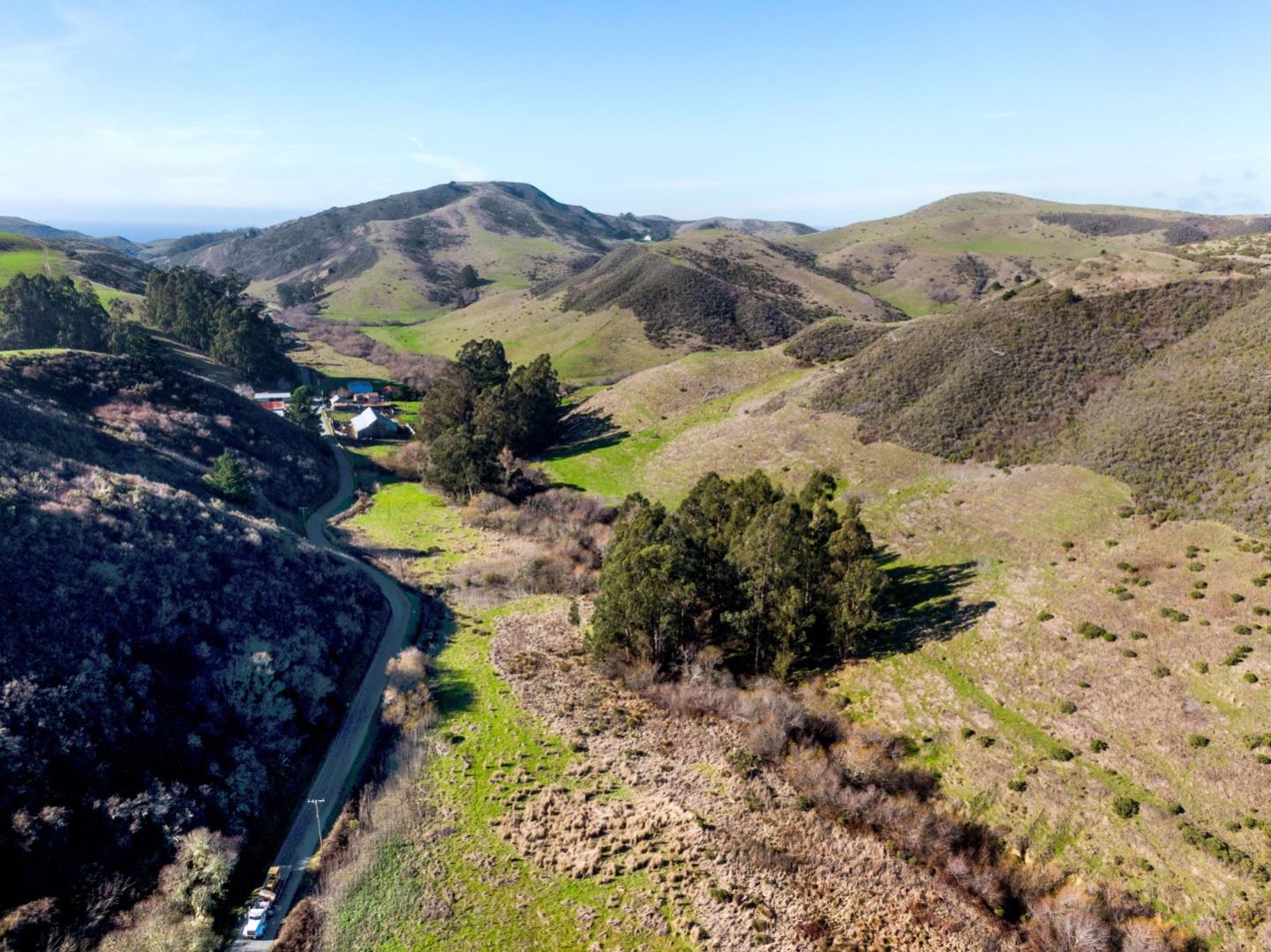 3225 Pomponio Creek Road San Gregorio, CA 94074 - Photo 3 of 24 a view of a mountain with a mountain