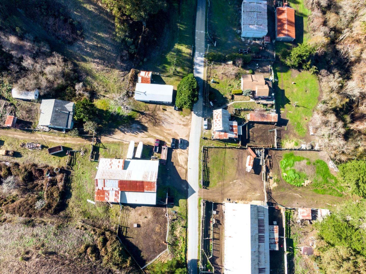3225 Pomponio Creek Road San Gregorio, CA 94074 - Photo 6 of 24 an aerial view of houses with outdoor space