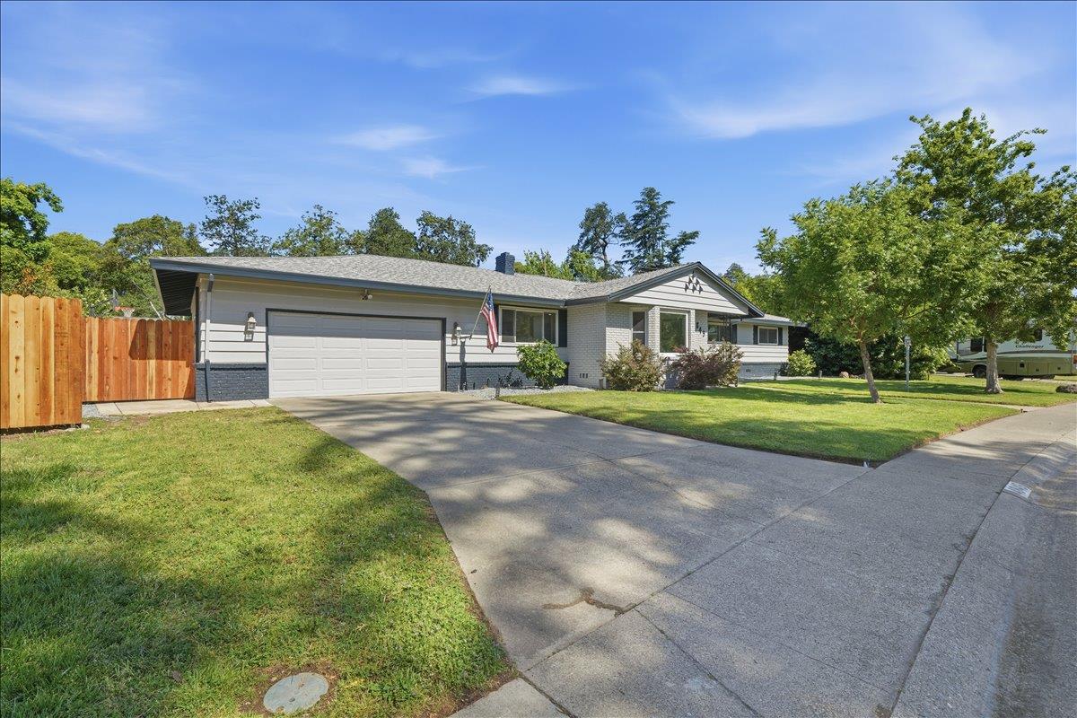 4849 Alexon Way Carmichael, CA 95608 - Photo 4 of 50 a house view with a garden space