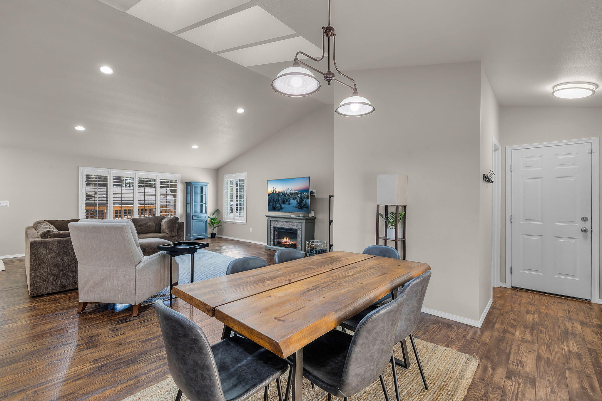 17064 Sacramento Road Bend, OR 97707 - Photo 15 of 50 a view of a dining room with furniture and wooden floor