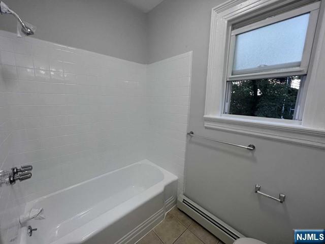 44 Gates Avenue, Unit 2 Montclair, NJ 07042 - Photo 12 of 15 a bathroom with a bathtub
