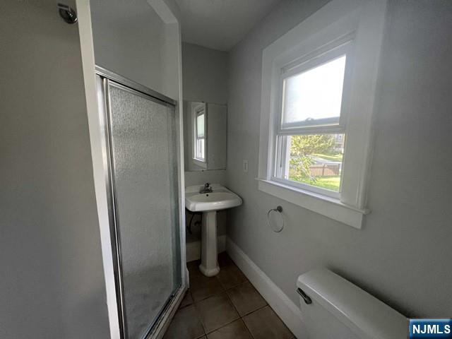 44 Gates Avenue, Unit 2 Montclair, NJ 07042 - Photo 13 of 15 a bathroom with a toilet sink and a mirror