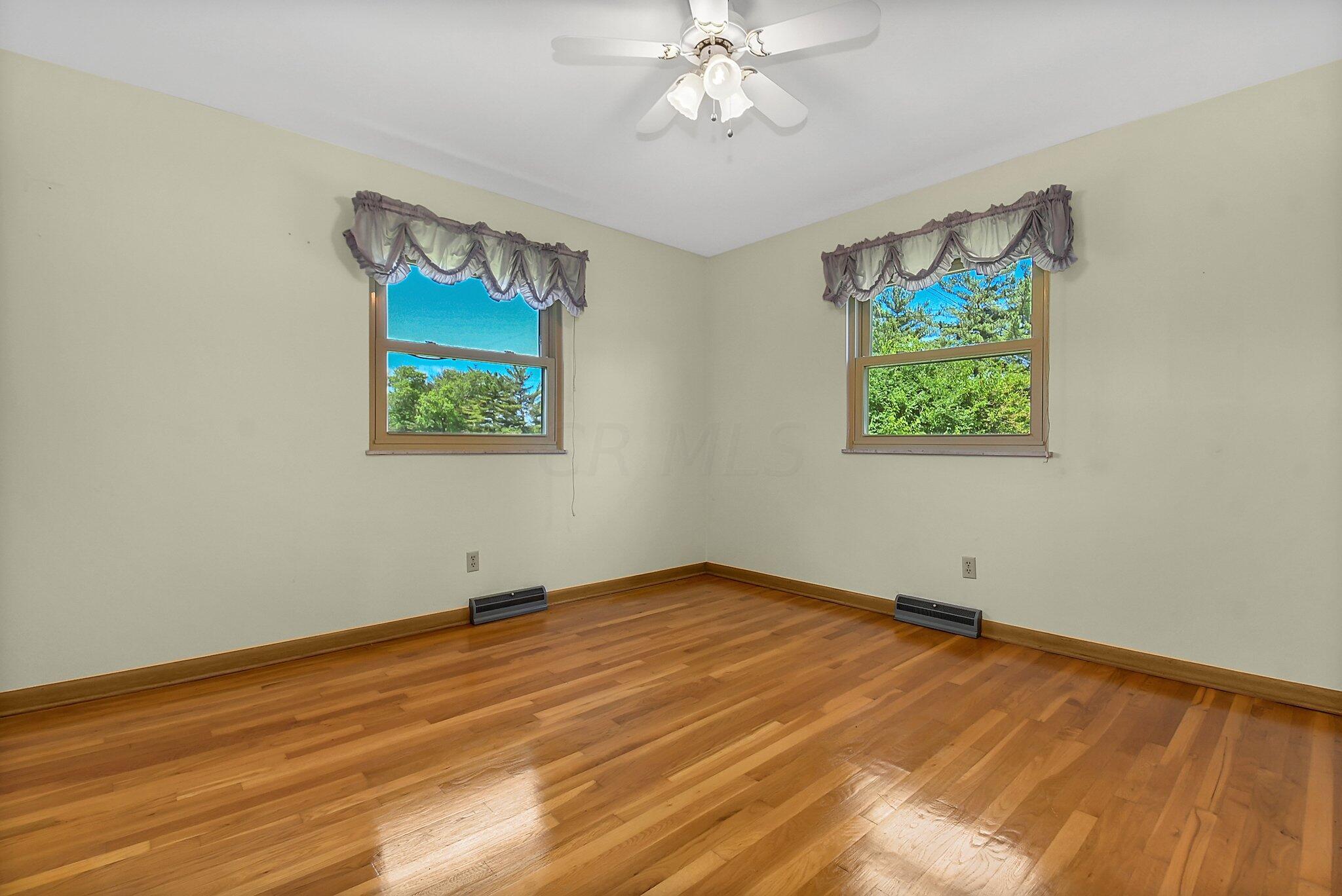 429 Amity Road Galloway, OH 43119 - Photo 14 of 27 Gleaming hardwood floors/vinyl replacement windows. Tilt