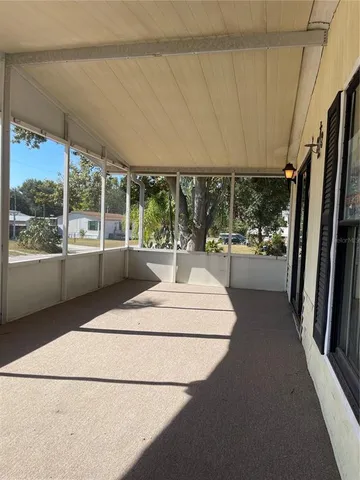 a view of open kitchen with a large window
