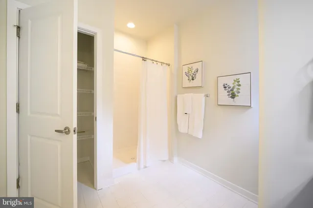 a view of a hallway with closet