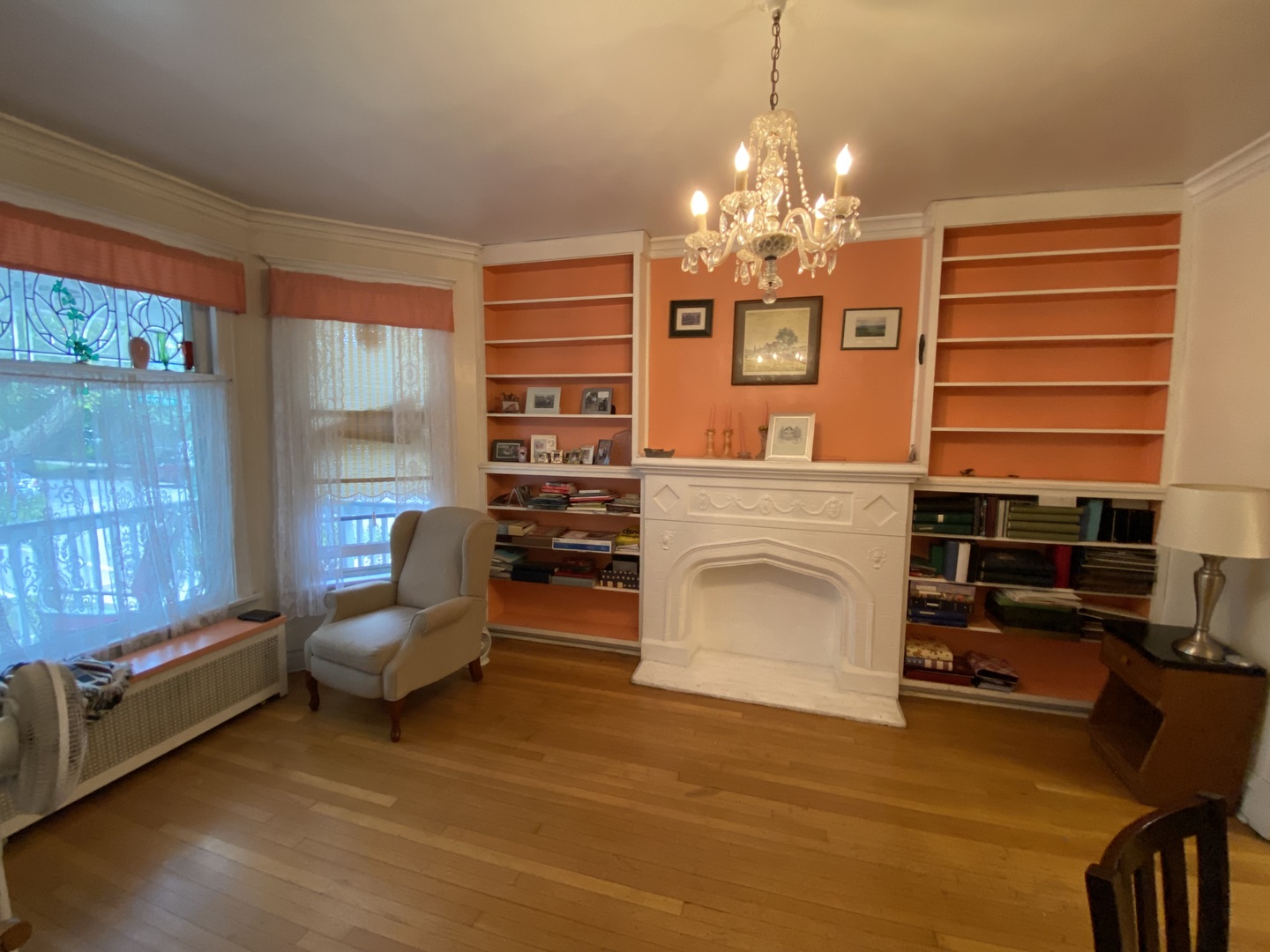 3902 North Hamilton Avenue Chicago, IL 60618 - Photo 6 of 24 a living room with furniture and a chandelier