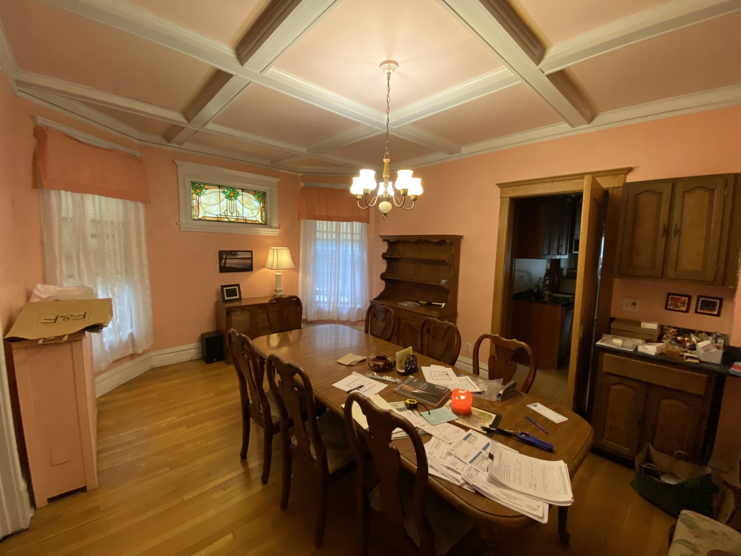 3902 North Hamilton Avenue Chicago, IL 60618 - Photo 7 of 24 a view of a dining room with furniture a chandelier and wooden floor