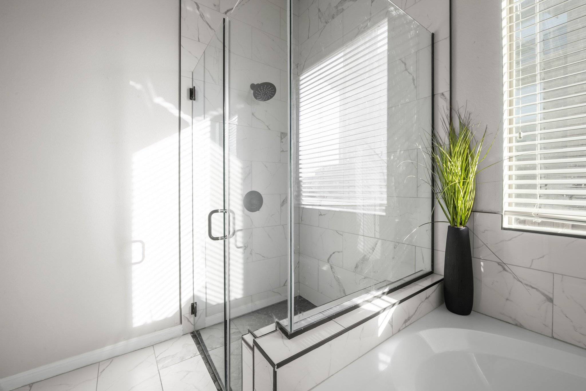 22112 Rock Wren Road Spicewood, TX 78669 - Photo 21 of 40 Full bathroom with a marble finish shower, a bath, and marble look tile flooring