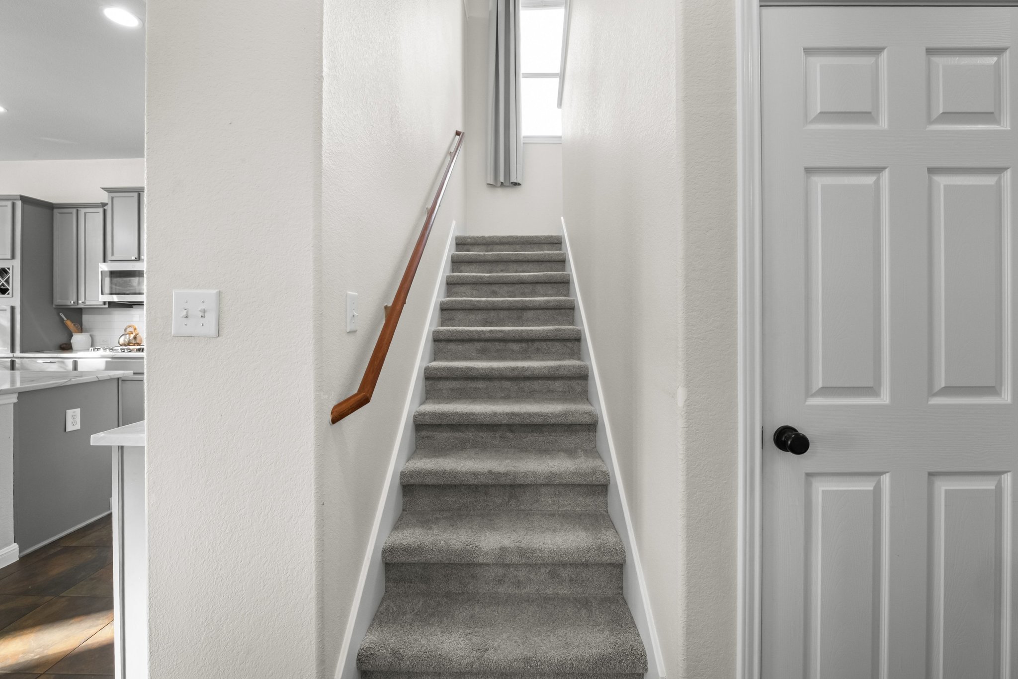 22112 Rock Wren Road Spicewood, TX 78669 - Photo 26 of 40 Stairs featuring a textured wall