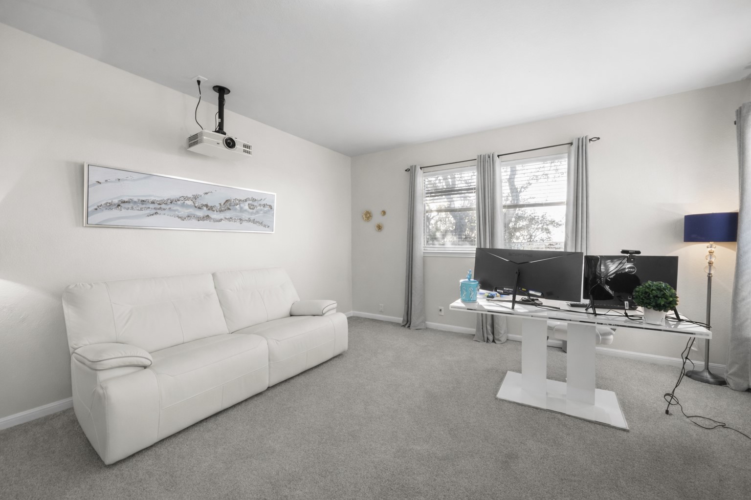 22112 Rock Wren Road Spicewood, TX 78669 - Photo 28 of 40 Home office featuring carpet flooring and baseboards