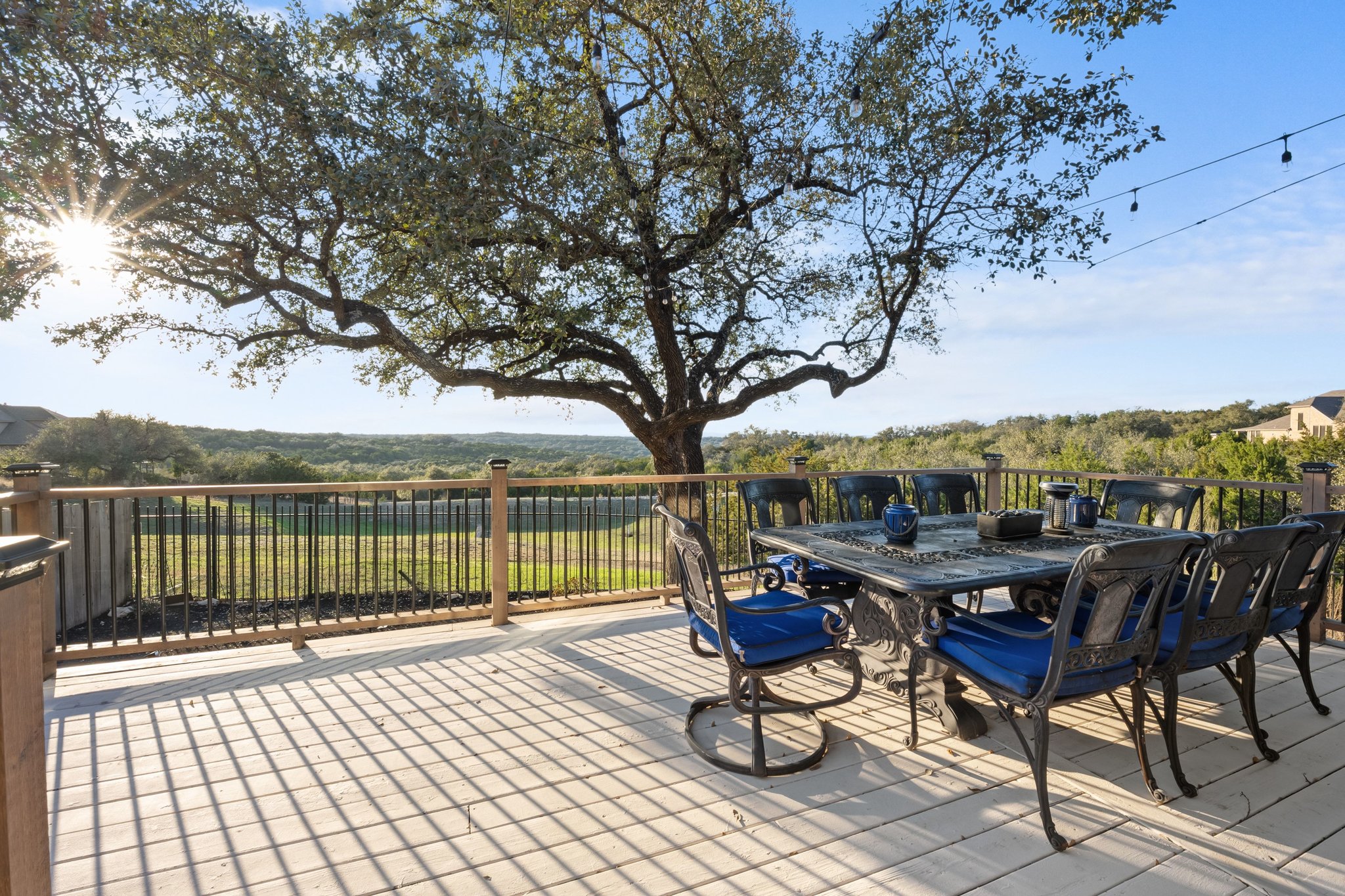 22112 Rock Wren Road Spicewood, TX 78669 - Photo 34 of 40 View of patio / terrace with outdoor dining area and a deck