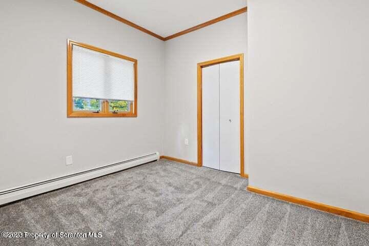 1703 Sanderson Street Scranton, PA 18512 - Photo 16 of 24 an empty room with a window