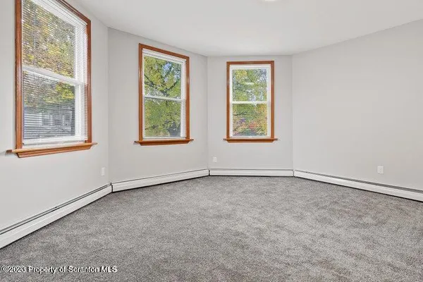 an empty room with an entryway