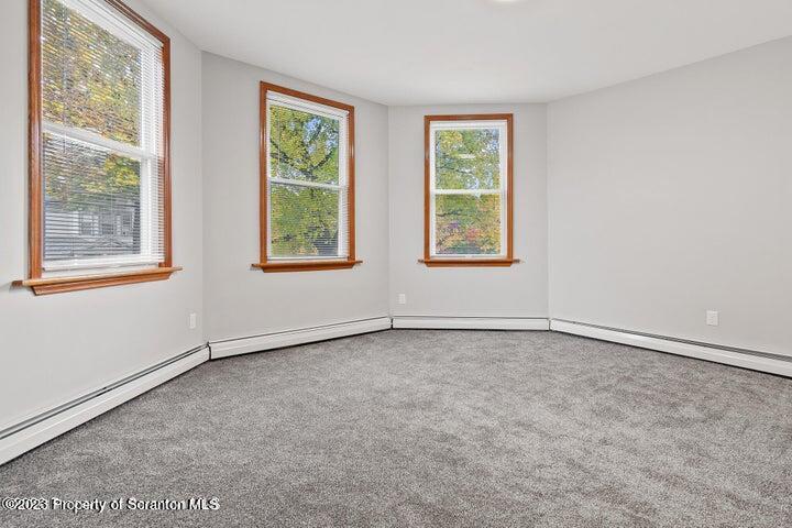 1703 Sanderson Street Scranton, PA 18512 - Photo 18 of 24 an empty room with windows