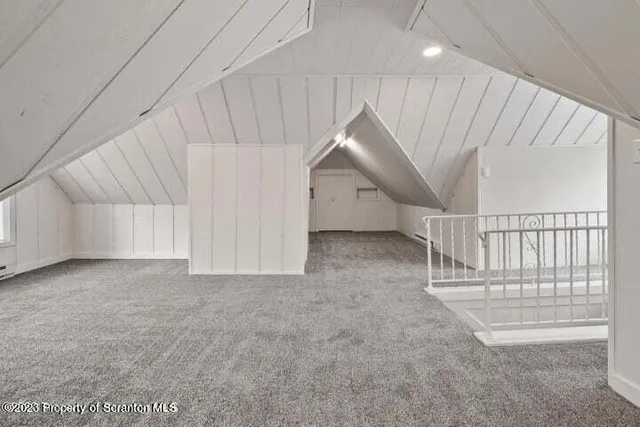 a view of a wooden roof deck