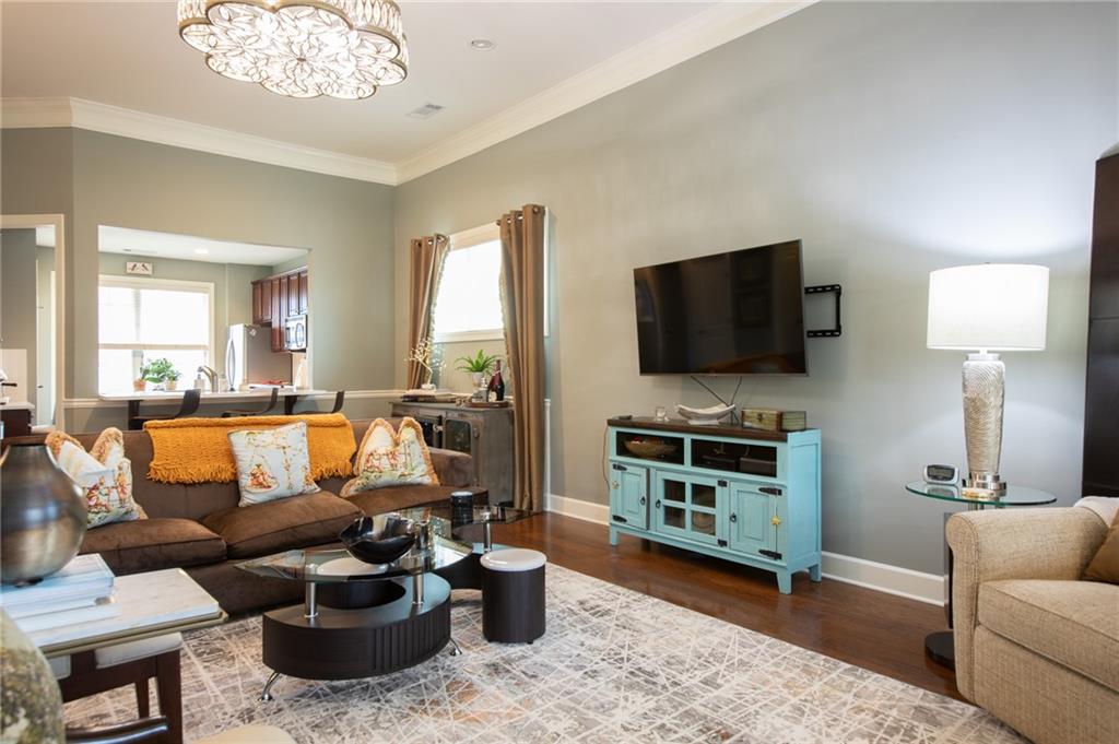 3538 Black Cherry Point Gainesville, GA 30504 - Photo 11 of 44 a living room with furniture and a flat screen tv