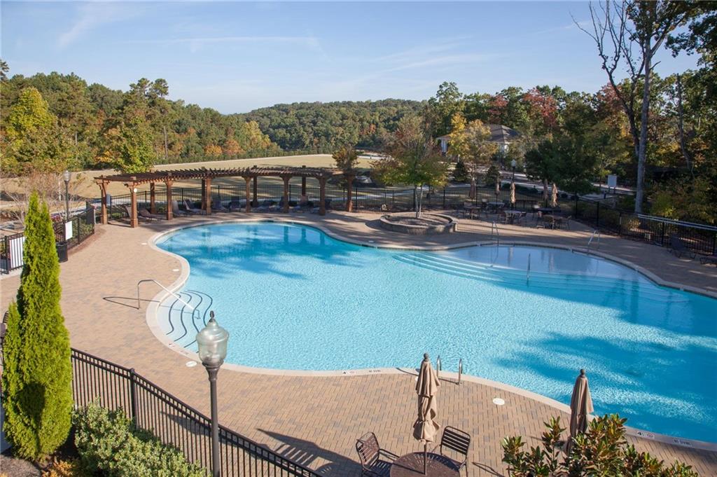 3538 Black Cherry Point Gainesville, GA 30504 - Photo 34 of 44 a view of a swimming pool with seating area