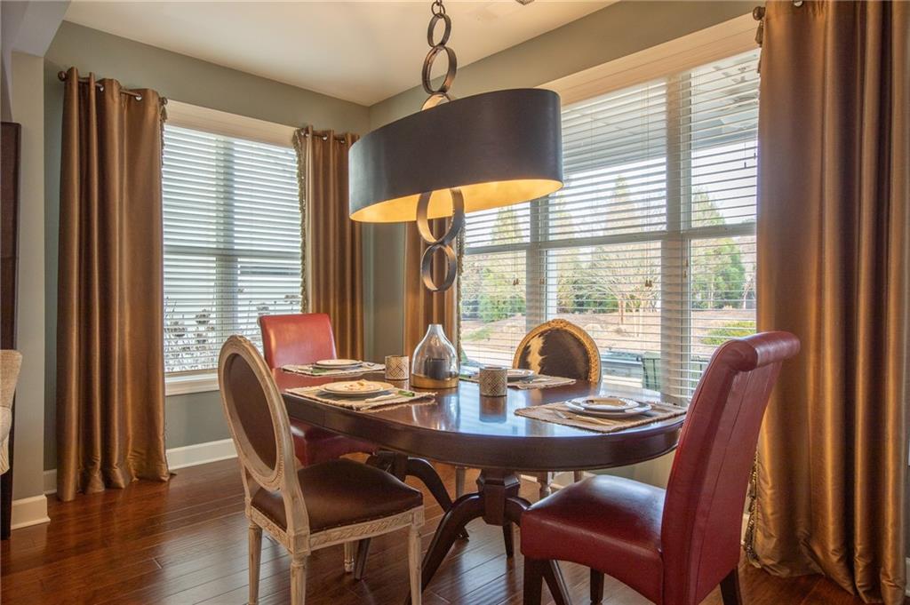 3538 Black Cherry Point Gainesville, GA 30504 - Photo 9 of 44 a view of a dining room with furniture and window