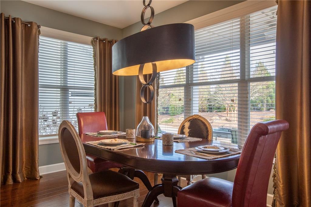 3538 Black Cherry Point Gainesville, GA 30504 - Photo 10 of 44 a view of a dining room with furniture and window