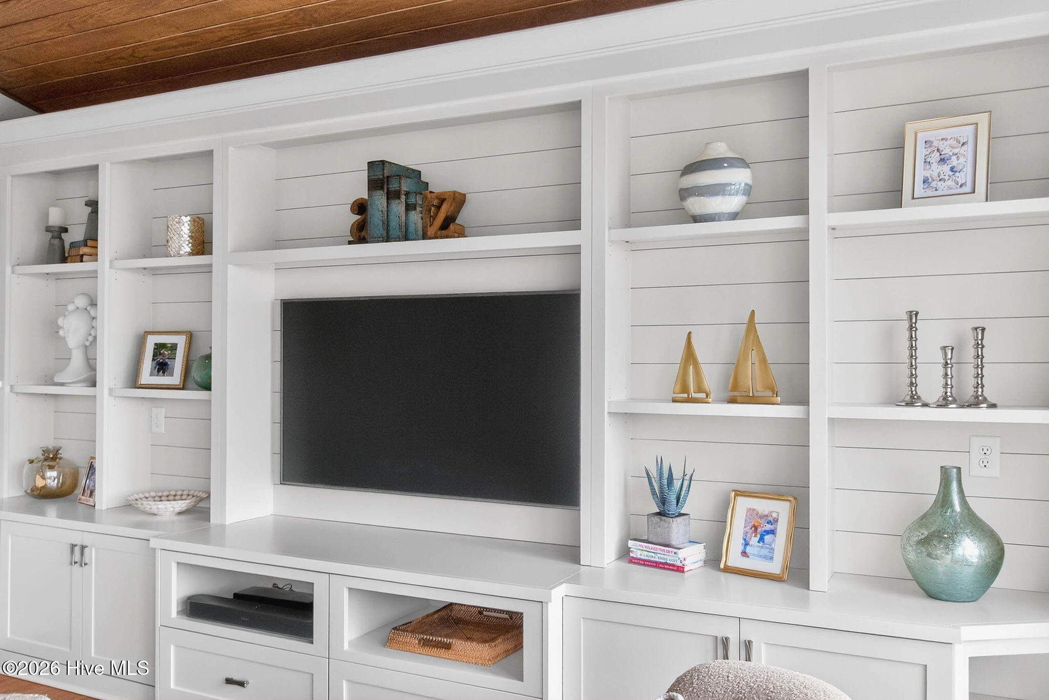 1416 Riverside Drive Sunset Beach, NC 28468 - Photo 22 of 83 Elegant custom shelving with coastal styling and functional storage in this Ocean Club Estates residence.