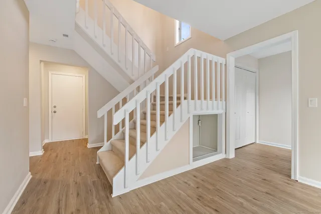 a view of entryway with wooden floor