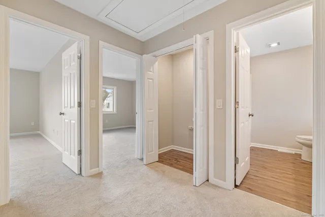 a view of a bathroom with a shower and a sink