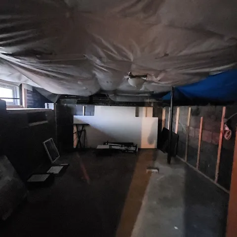 a view of a room with furniture