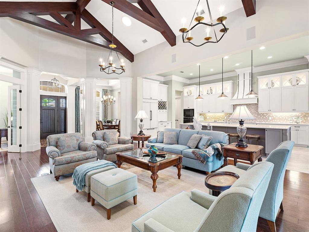 16336 Daysailor Trail Lakewood Ranch, FL 34202 - Photo 23 of 88 a living room with furniture kitchen view and a chandelier