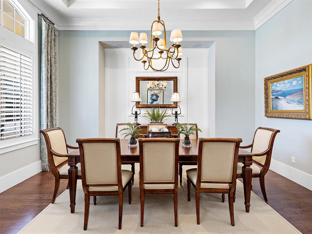 16336 Daysailor Trail Lakewood Ranch, FL 34202 - Photo 25 of 88 a view of a dining room with furniture and wooden floor