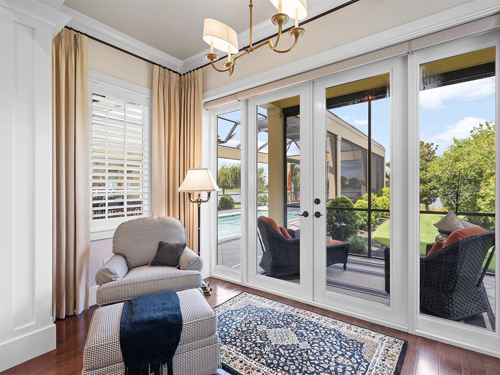 16336 Daysailor Trail Lakewood Ranch, FL 34202 - Photo 37 of 88 a living room with furniture and a window