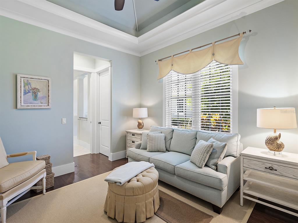 16336 Daysailor Trail Lakewood Ranch, FL 34202 - Photo 54 of 88 a living room with furniture and a window