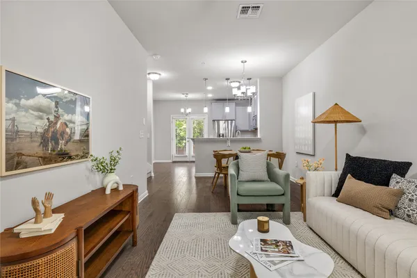 a view of an empty room and a window
