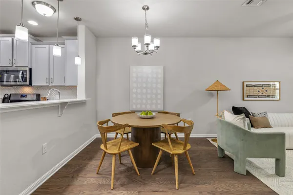 an empty room with closet and a large window