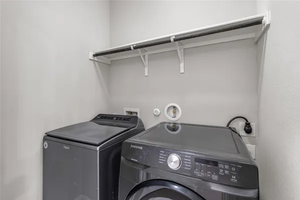 a view of a house with a garage