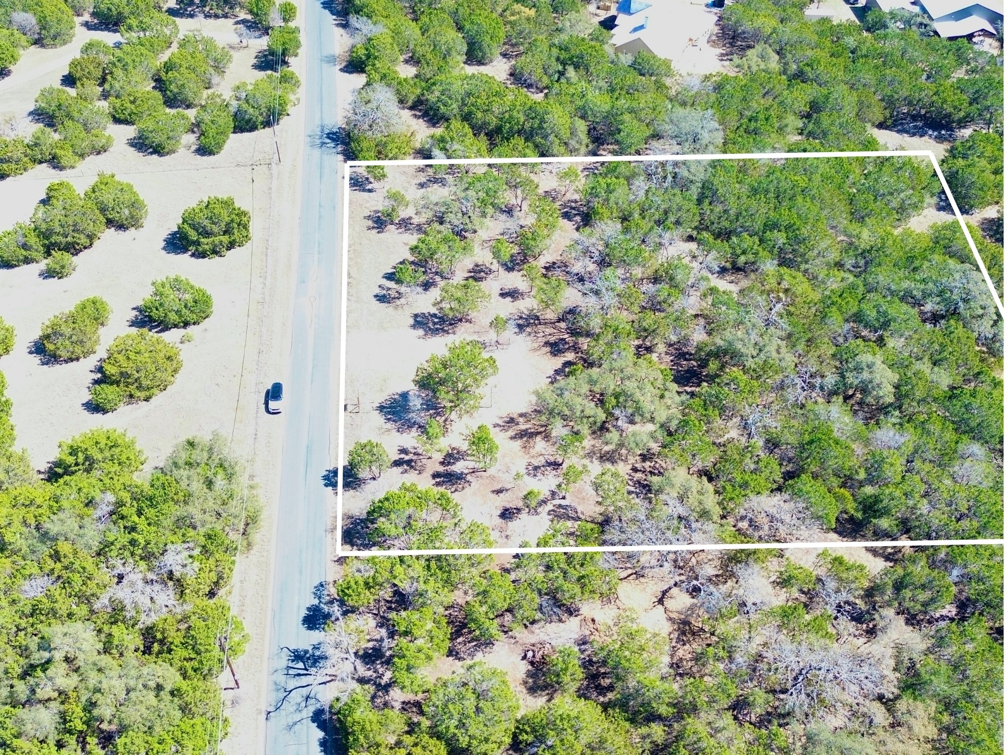 Aerial overview of property's location with property boundaries highlighted