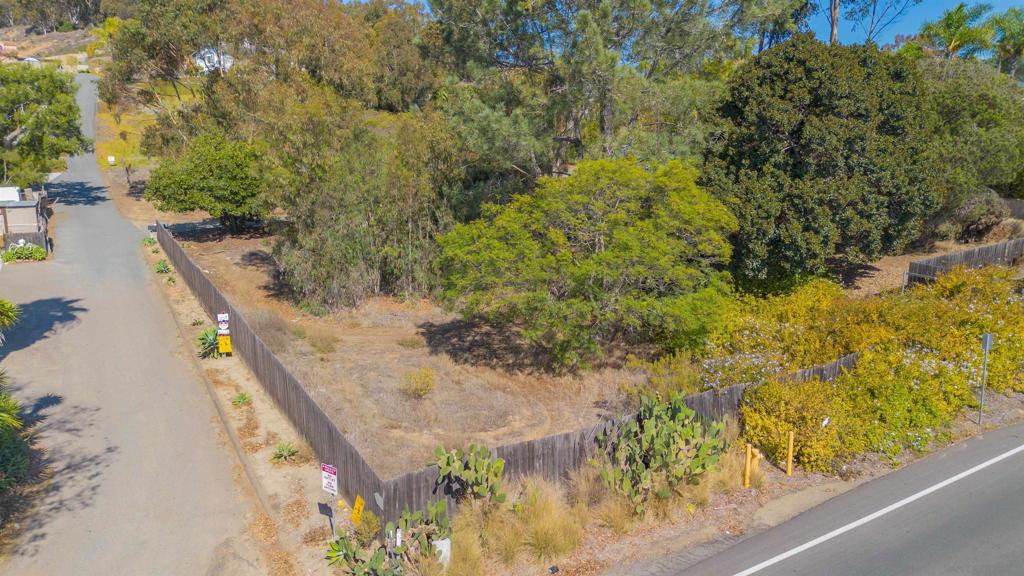 3703 Manchester Avenue Encinitas, CA 92024 - Photo 9 of 23 a view of a lake with a house in the background