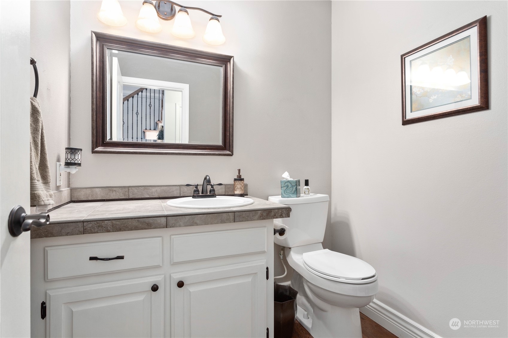212 Springview Drive Lynden, WA 98264 - Photo 18 of 40 a bathroom with a toilet a sink and mirror