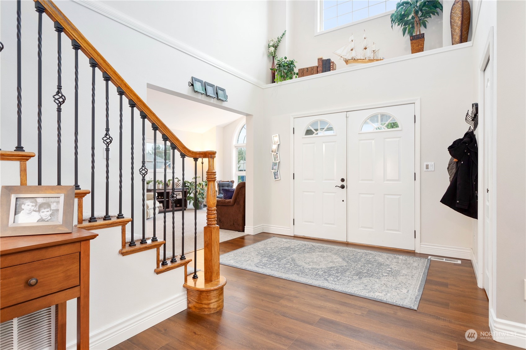 212 Springview Drive Lynden, WA 98264 - Photo 3 of 40 a view of entryway and hall with wooden floor