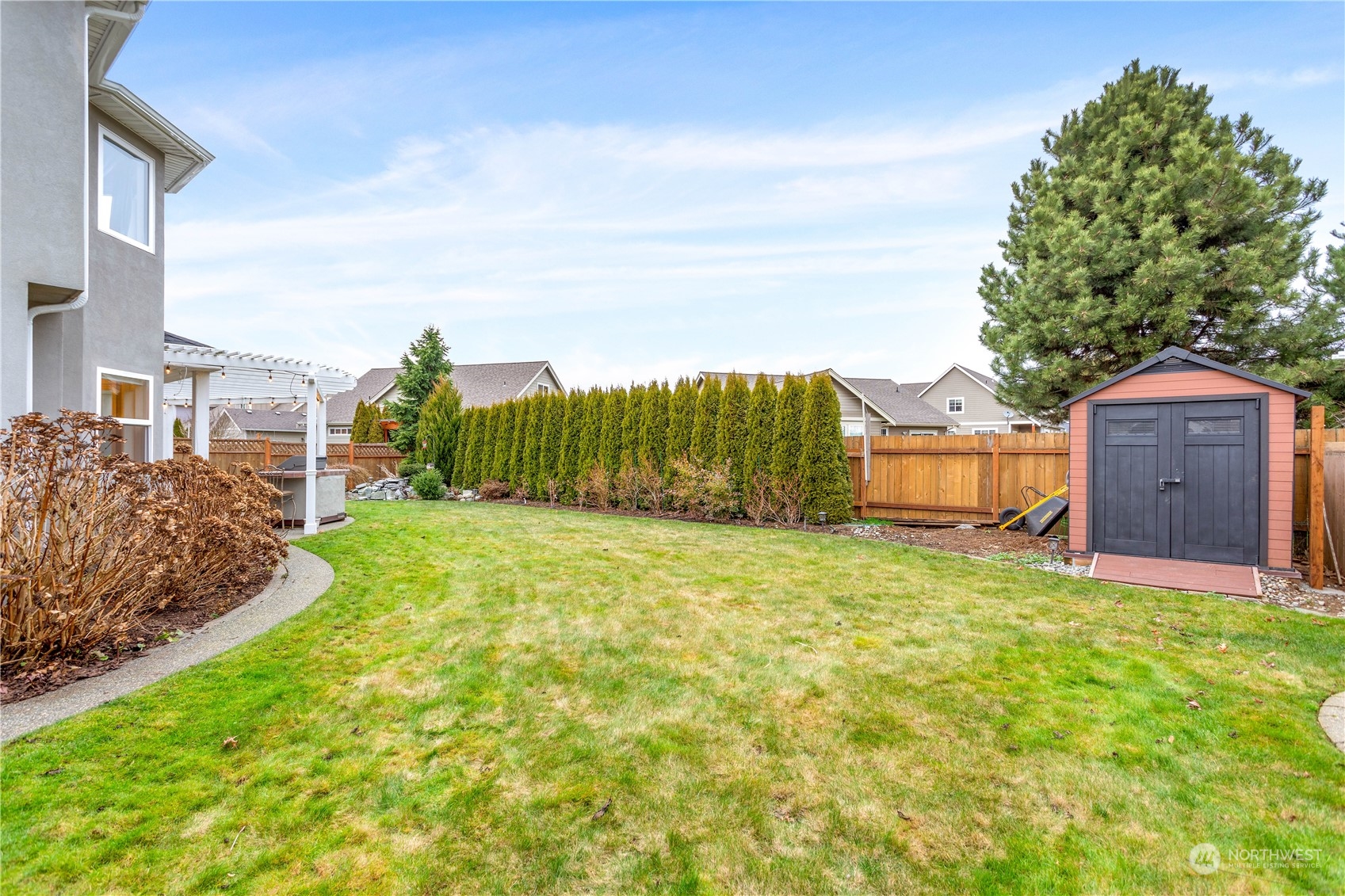 212 Springview Drive Lynden, WA 98264 - Photo 37 of 40 a backyard of a house