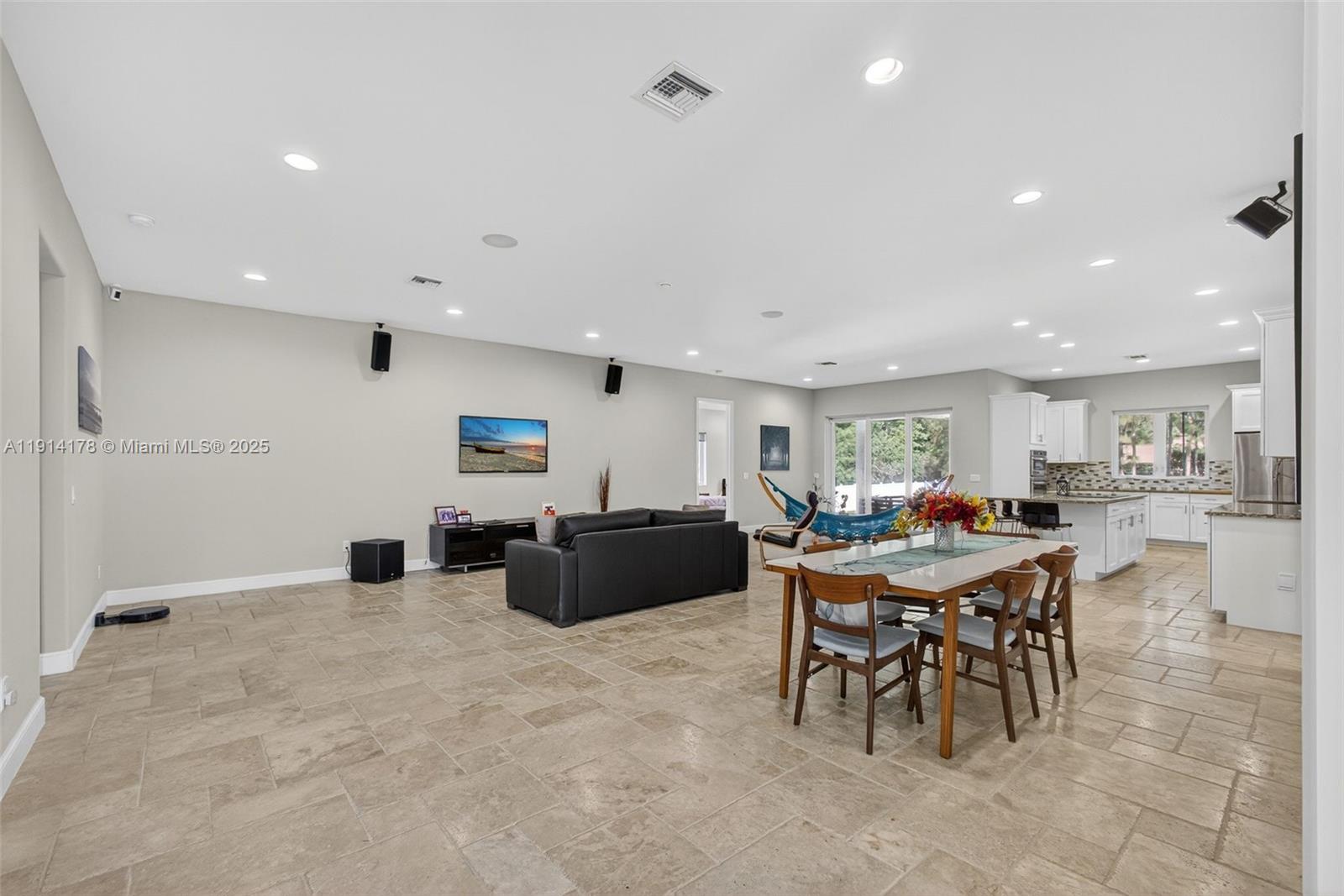 18369 Mellen Lane Jupiter, FL 33478 - Photo 12 of 84 a view of a dining room with furniture