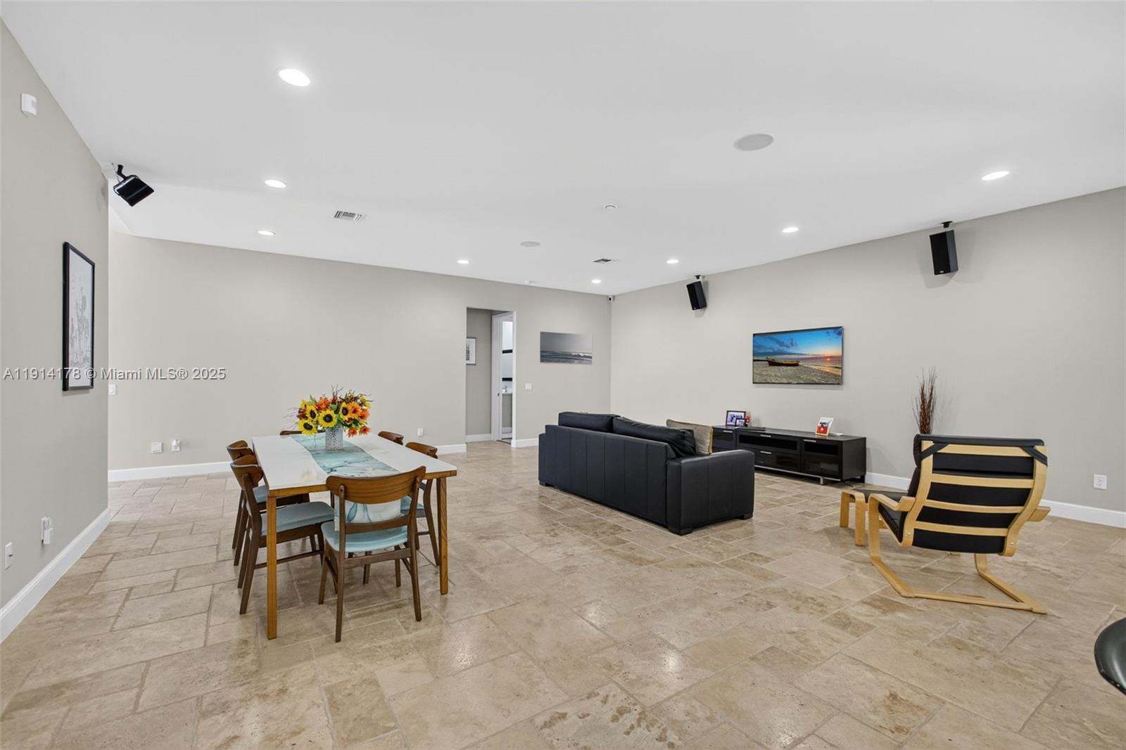 18369 Mellen Lane Jupiter, FL 33478 - Photo 14 of 84 a living room with furniture and wooden floor