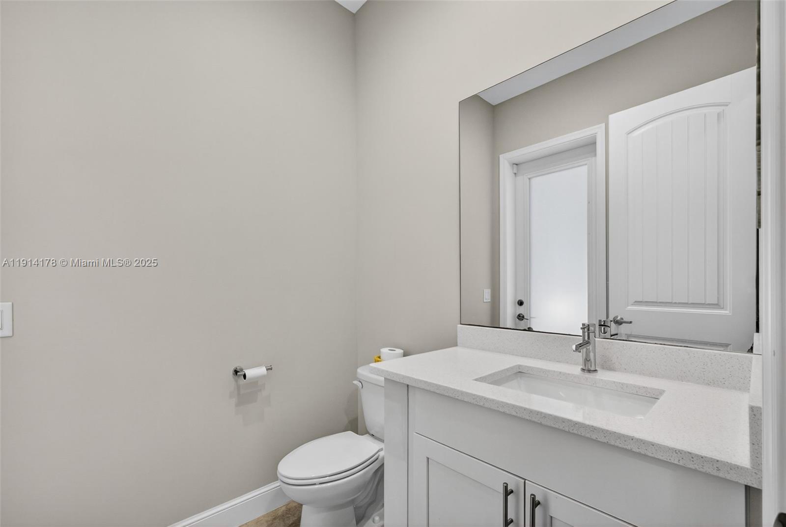 18369 Mellen Lane Jupiter, FL 33478 - Photo 49 of 84 a bathroom with a sink and a toilet