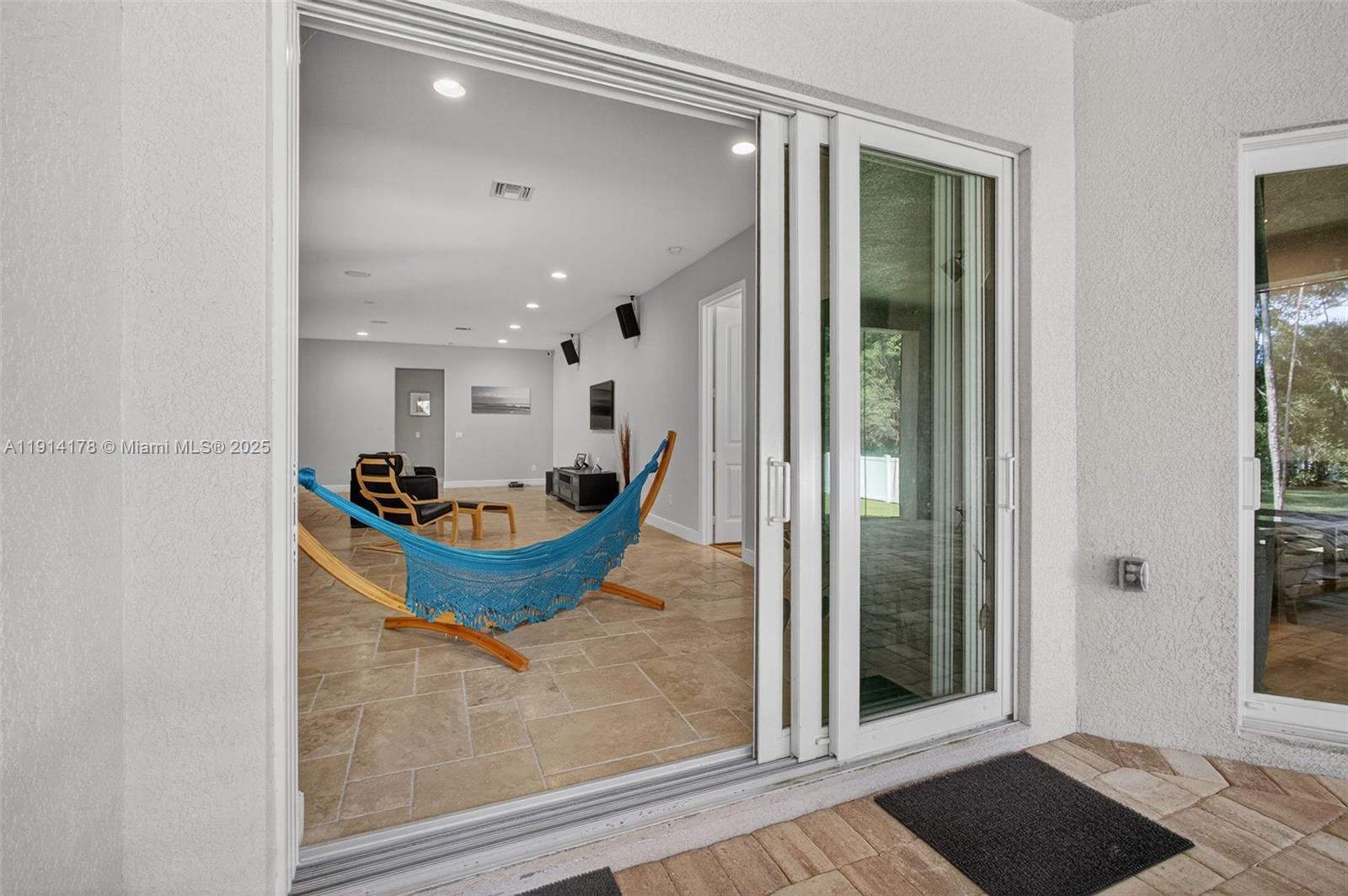 18369 Mellen Lane Jupiter, FL 33478 - Photo 51 of 84 a view of a entryway door of the house