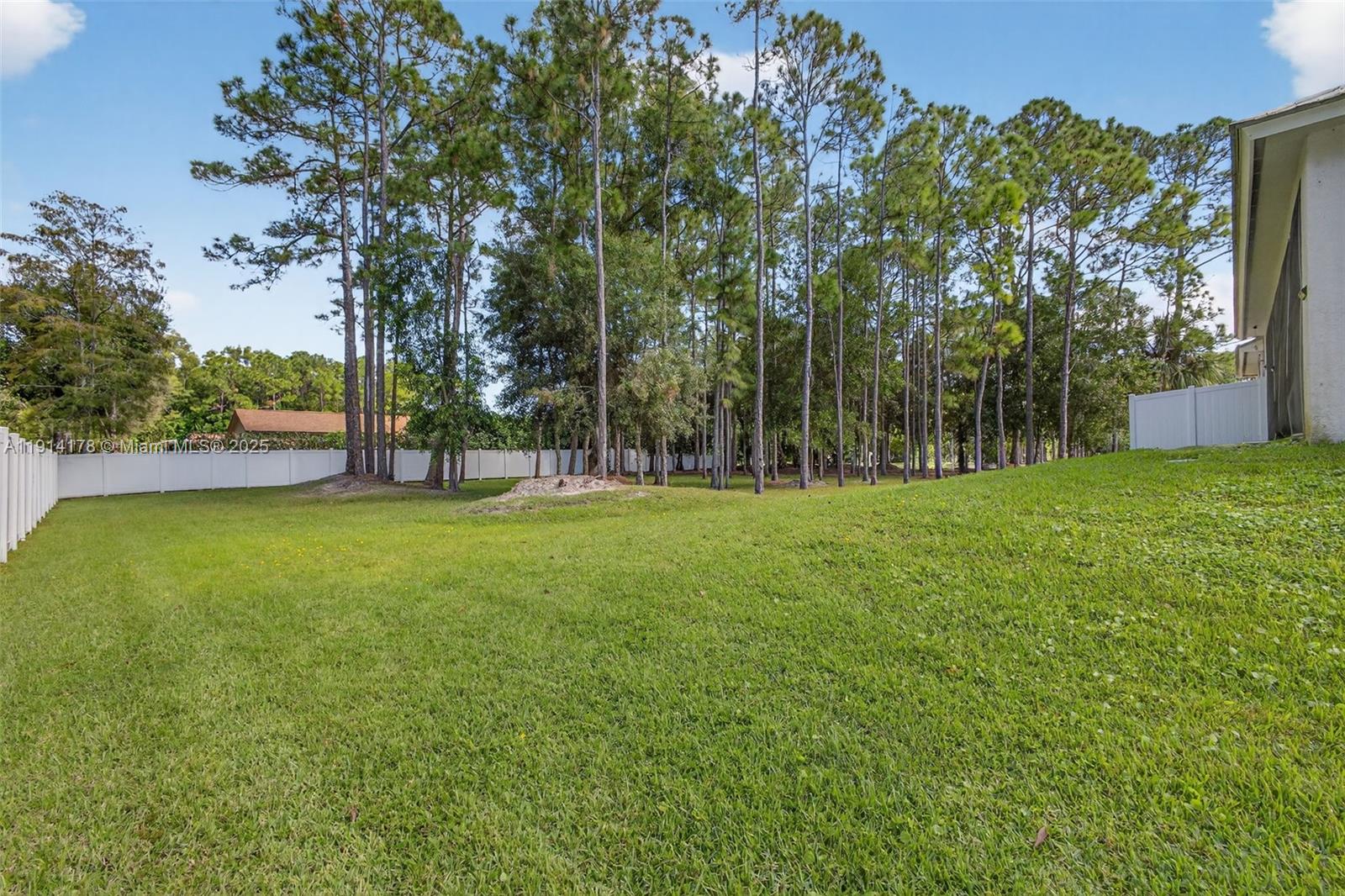 18369 Mellen Lane Jupiter, FL 33478 - Photo 64 of 84 a view of a park with large trees